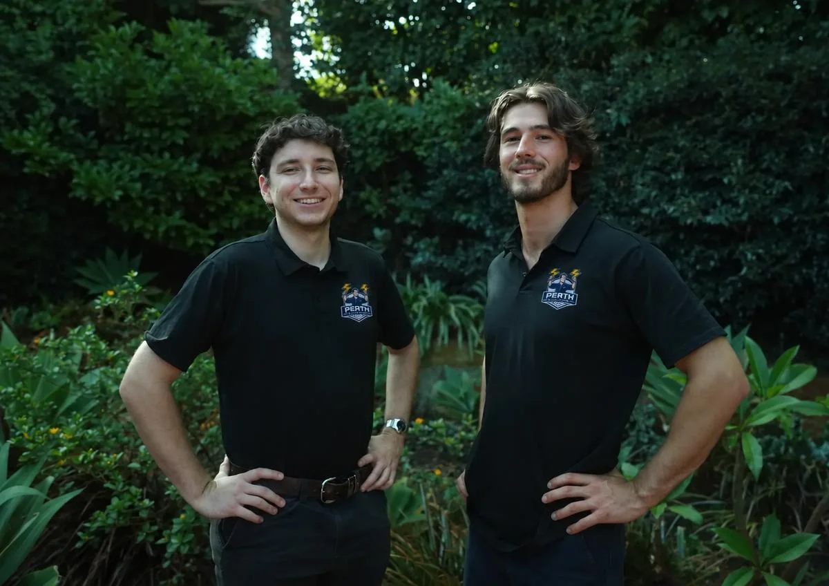 Two Electrician Perth team members wearing polos with the Perth Electrical WA badge